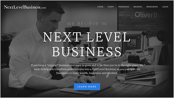 Esta é uma captura de tela do site Next Level Business, uma empresa administrada por Oli Billson. No canto superior esquerdo está o nome do site em texto branco, NextLevelBusiness.com. No canto superior direito estão as opções de navegação em texto branco. As opções são Home, Story, Programs, Reviews Resources e Login. No centro da página, em texto branco, um título diz: “Acreditamos no próximo nível de negócios”. Abaixo do título está uma breve declaração: “Se você tem um negócio‘ normal ’e deseja crescer e escalar, então você está no lugar certo. Queremos ajudá-lo a transformar seu negócio em um Negócio de Próximo Nível para que você possa abrir as comportas para mais riqueza, felicidade e liberdade. ” Na parte inferior da página, há um botão azul com texto em branco denominado “Aprender Mais". O plano de fundo da página da web é uma foto em preto e branco de um homem branco com cabelo curto sentado em uma mesa digitando em um laptop da Apple. Ele está vestindo uma camisa branca de botões e um relógio no pulso esquerdo. Na escrivaninha está um livro empilhado em cima de uma pasta branca. Ele está sentado em um ambiente de escritório aberto com outras mesas e computadores.