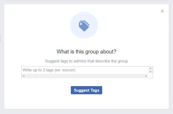 Um pop-up encontrado nos Grupos do Facebook pede aos membros que sugiram tags que descrevam o grupo.