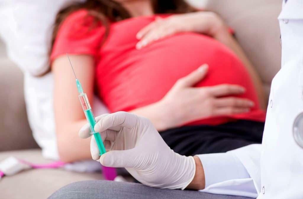 Em que meses de gravidez deve ser administrada a vacina contra a gripe?