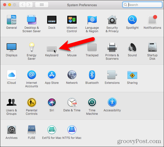 Clique em Teclado nas Preferências do Sistema em um Mac.