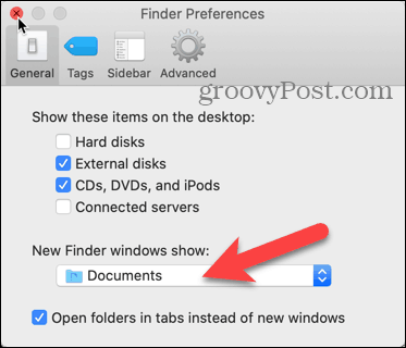 Clique na lista suspensa Mostrar novas janelas do Finder em Preferências do Finder no seu Mac