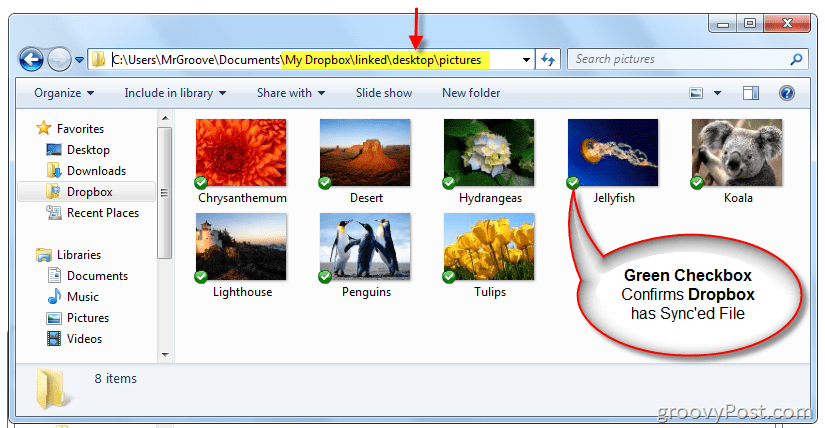 O Windows Explorer confirma que o Symlink foi criado e o Dropbox está sincronizando arquivos