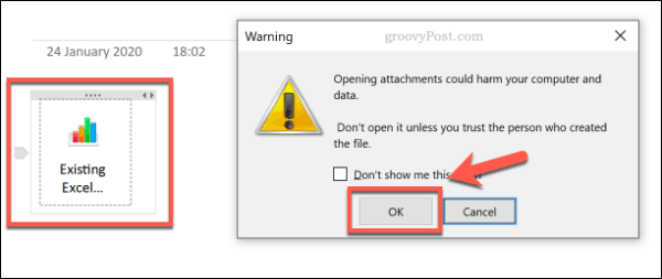 Um aviso de abertura de anexo de arquivo no OneNote
